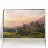 Mid-century modernist art depicting a serene Irish landscape in muted green and blue tones, framed in white acrylic.