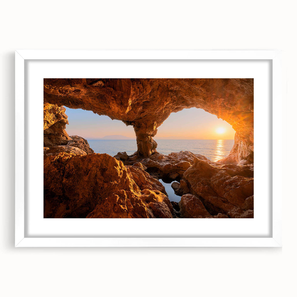 Textured art depicting abstract Sicilian landscape in muted earth tones on a framed white mat, suitable for bedroom decor.