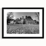 Extra large abstract art print of a colorful European scenery, textured finish on a framed black mat.
