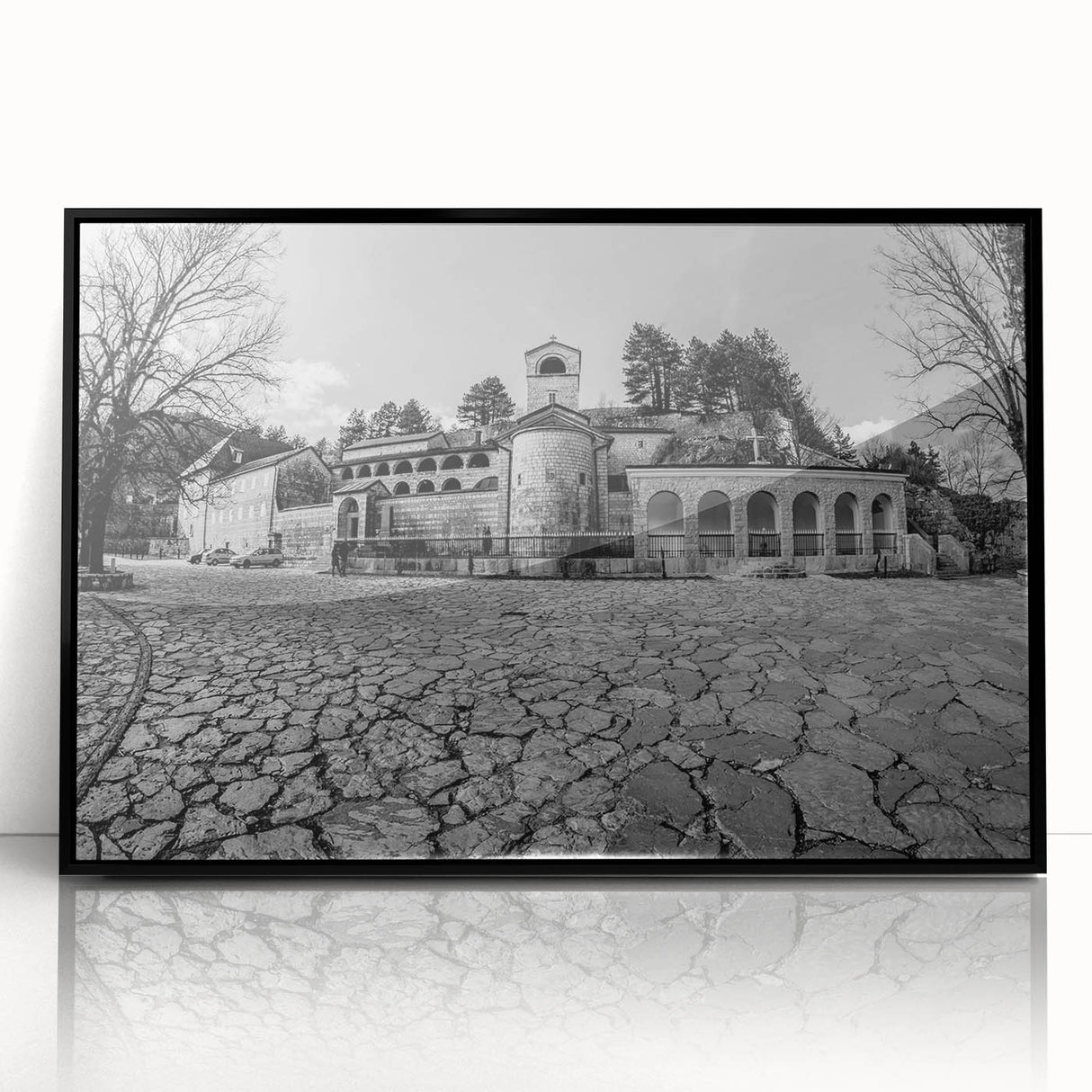 Large abstract wall art depicting a European landscape in Montenegro, with muted earth tones on a framed acrylic.