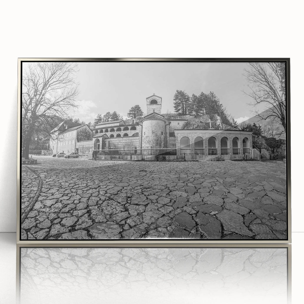 Large art print of a Montenegro scenery in mid-century modernist style, framed in silver acrylic.