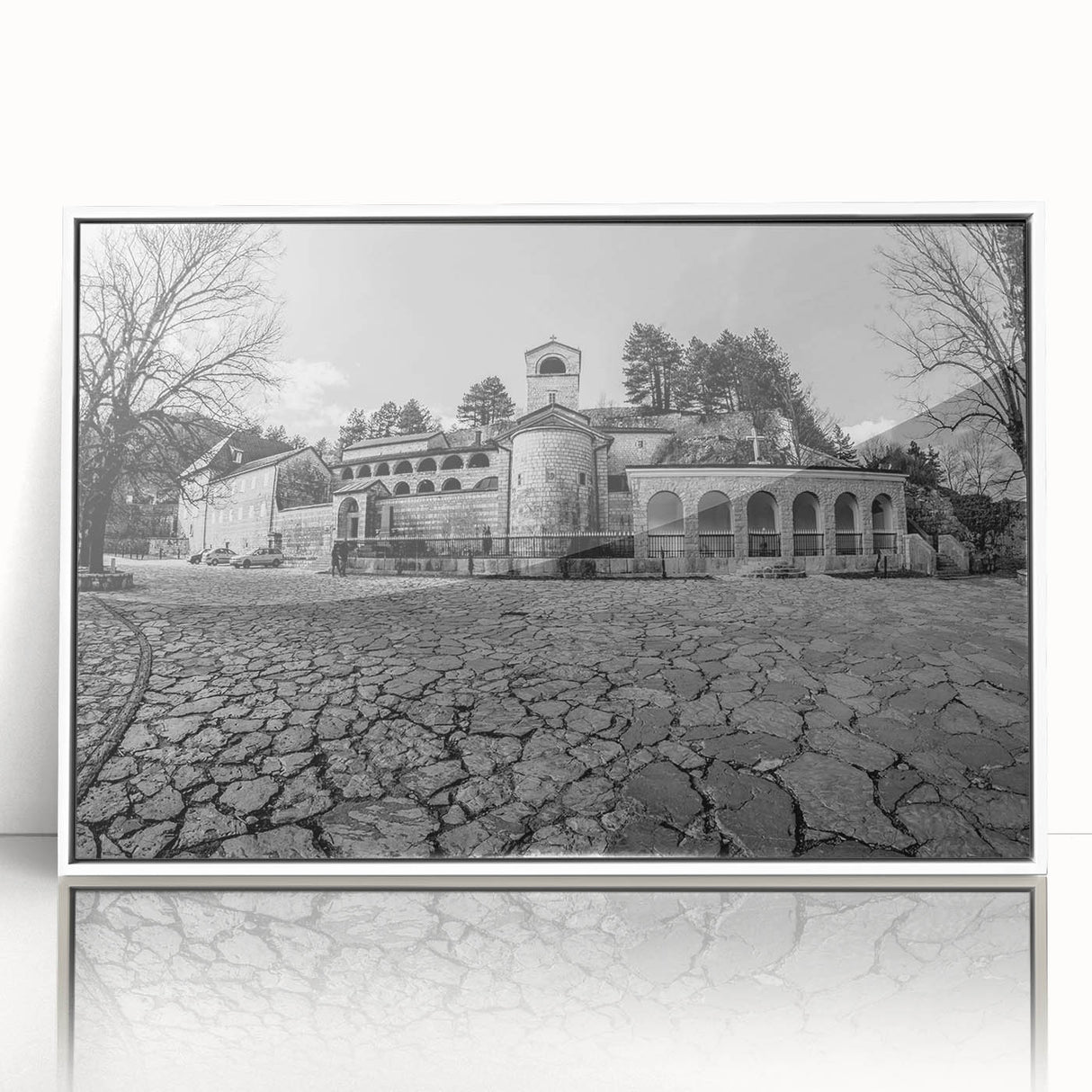 Mid-century modernist art depicting a serene Montenegro landscape in muted earth tones, acrylic print framed in white.
