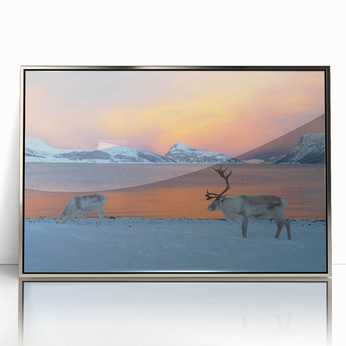 Large art print of a serene Norwegian landscape in muted green and blue tones, framed in silver acrylic.