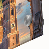 Large abstract wall art depicting a European cityscape in muted gray and blue tones on acrylic glass.