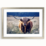 Abstract art print of a European scenery in textured strokes on a silver-framed canvas.
