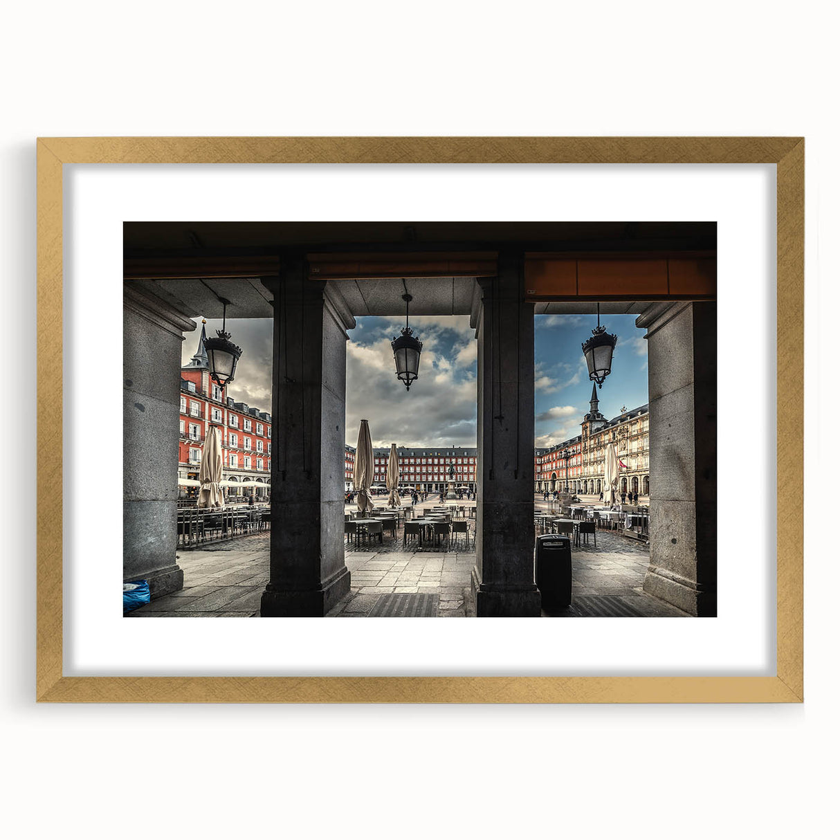 Extra large abstract art print of Madrid scenery in muted earth tones on a textured canvas, framed in gold.