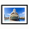 Extra large abstract art print of a vibrant, colorful European cityscape on a textured canvas, framed in black.