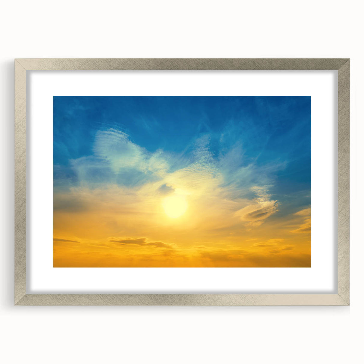 Textured art print of abstract scenery in muted earth tones, framed in silver, ideal for bedroom decor.