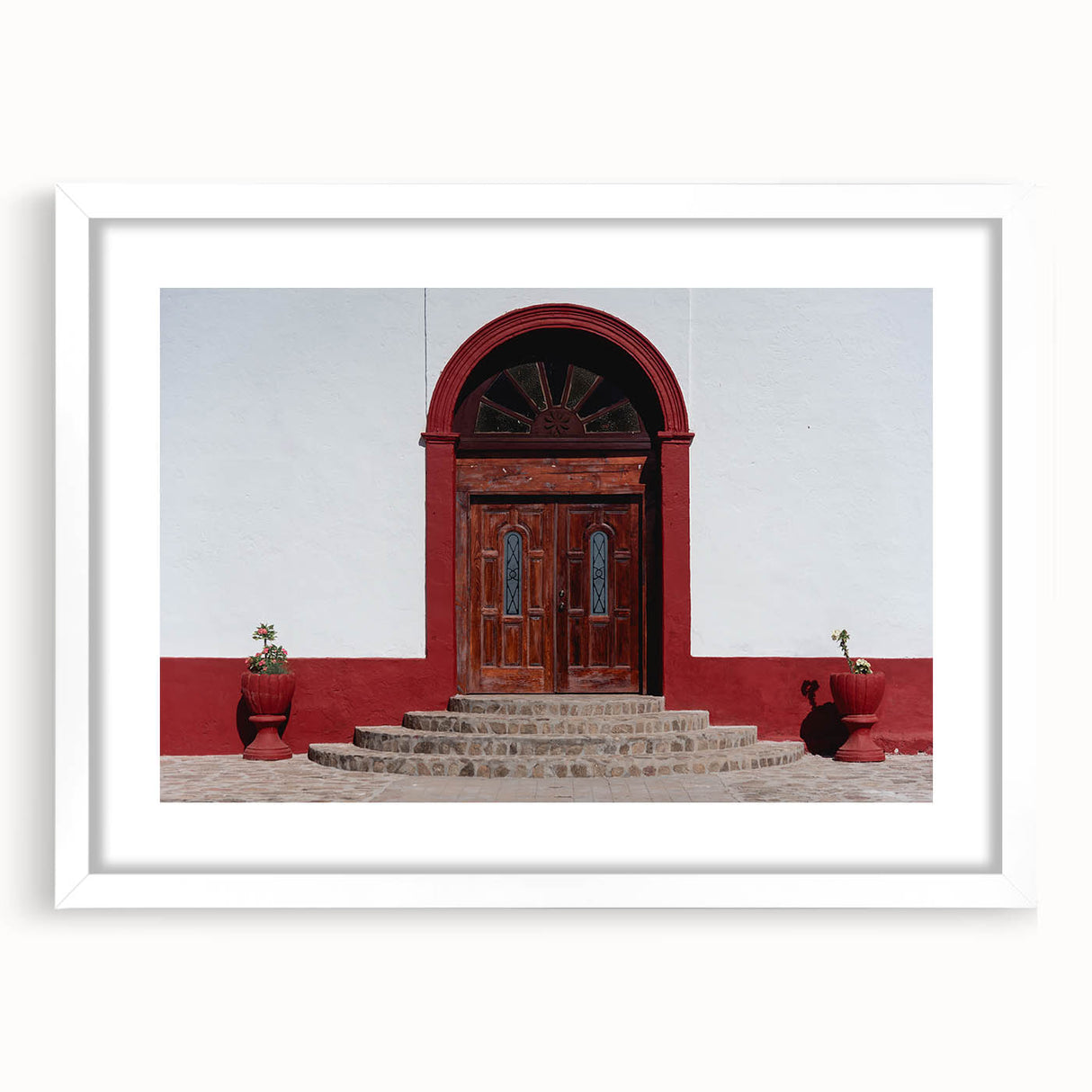 Abstract art print of Baja California scenery in muted earth tones, framed with a white mat, suitable for dining room decor.