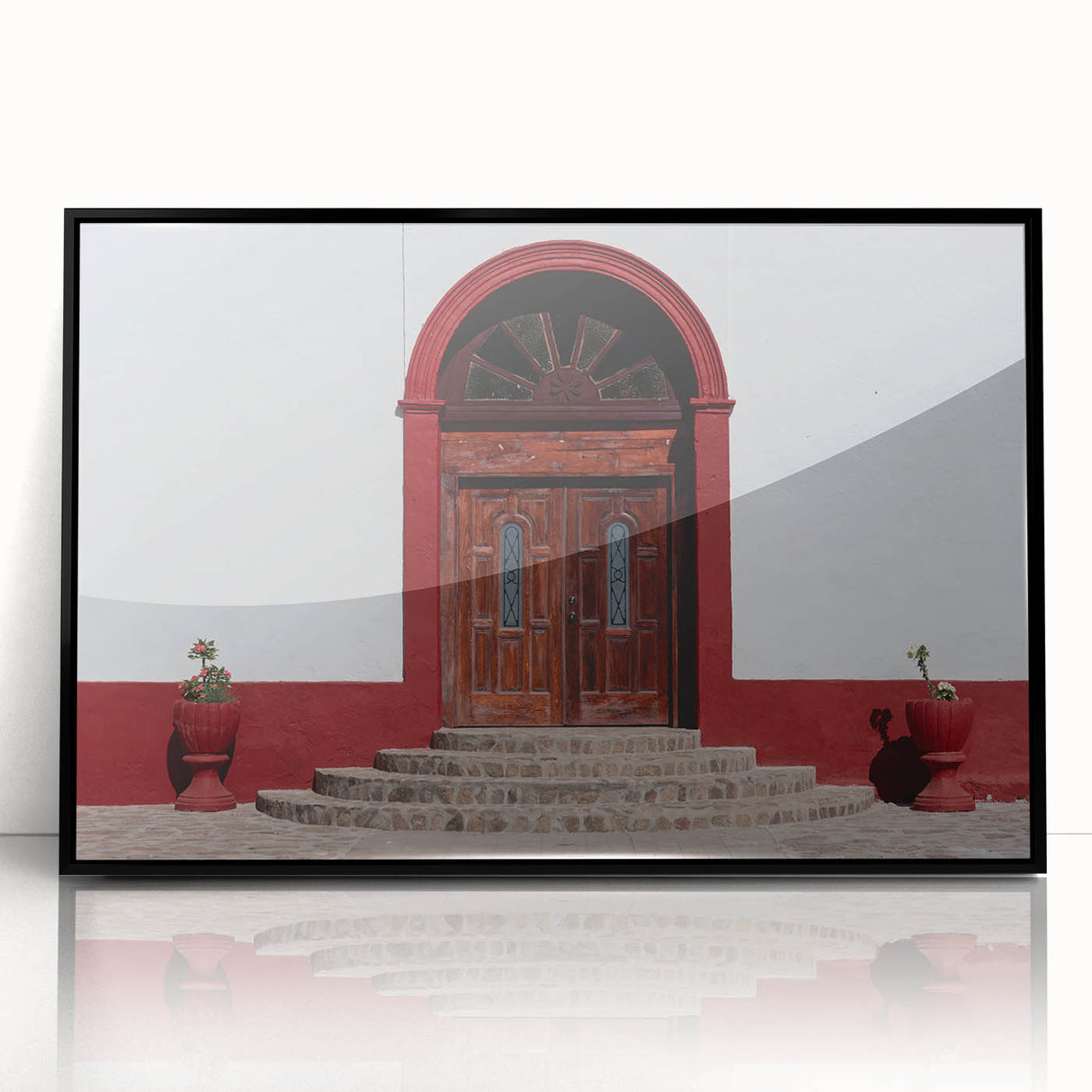 Large abstract wall art featuring a minimalist Baja California scenery in muted earth tones on a black framed acrylic.