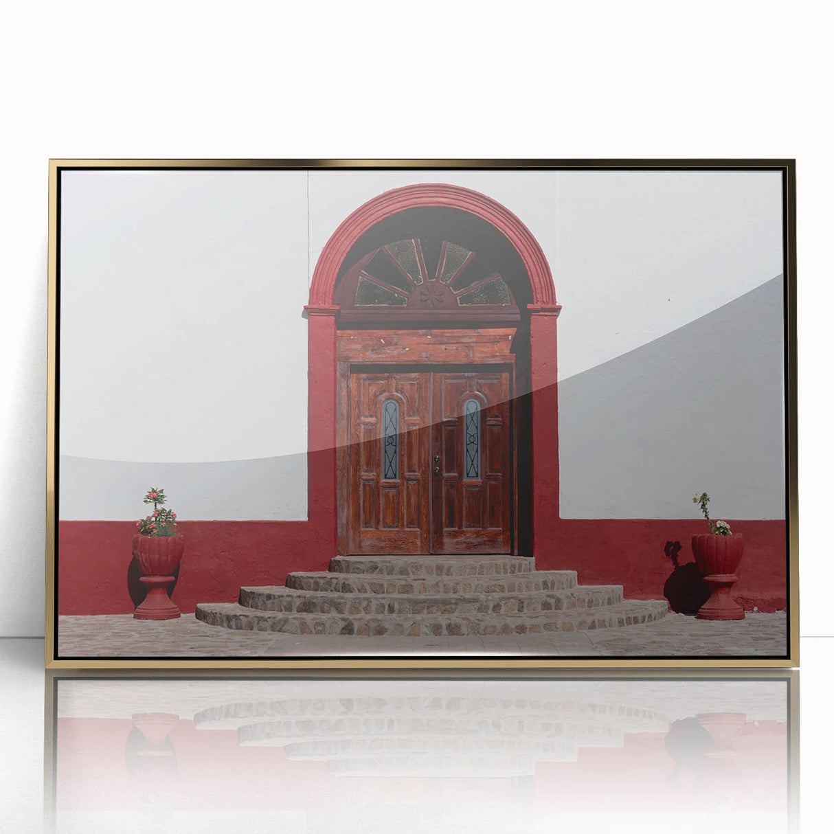 Large art print of Baja California scenery in muted earth tones, framed in gold acrylic, suitable for modern nursery decor.