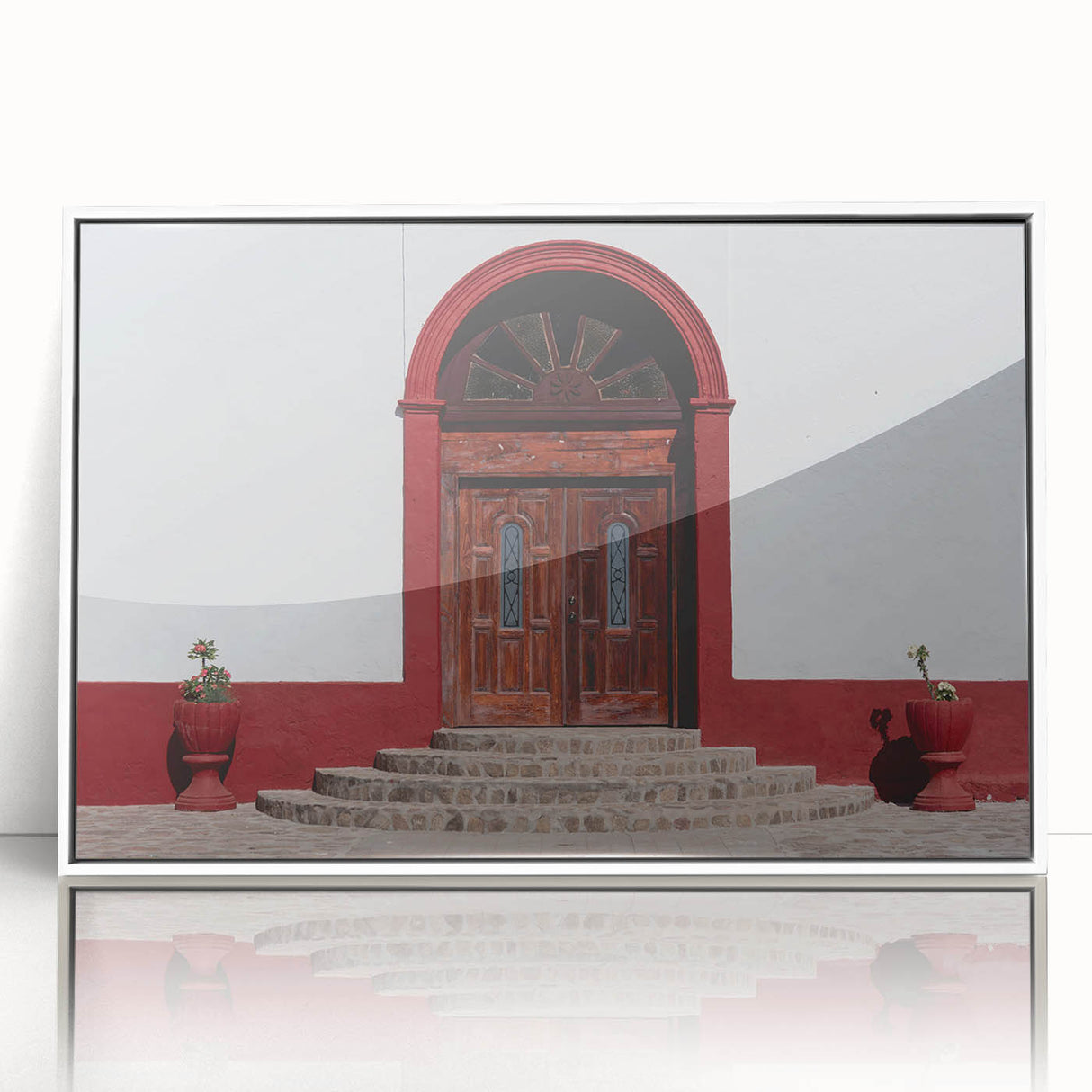 Art deco poster of Baja California scenery in acrylic frame, with pastel blue and white tones.