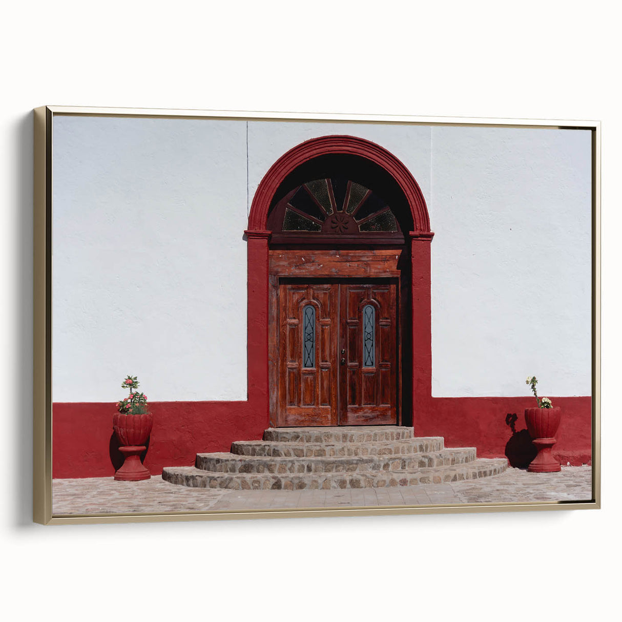 Framed canvas wall art featuring a vintage-style landscape painting of Baja California with muted earth tones.
