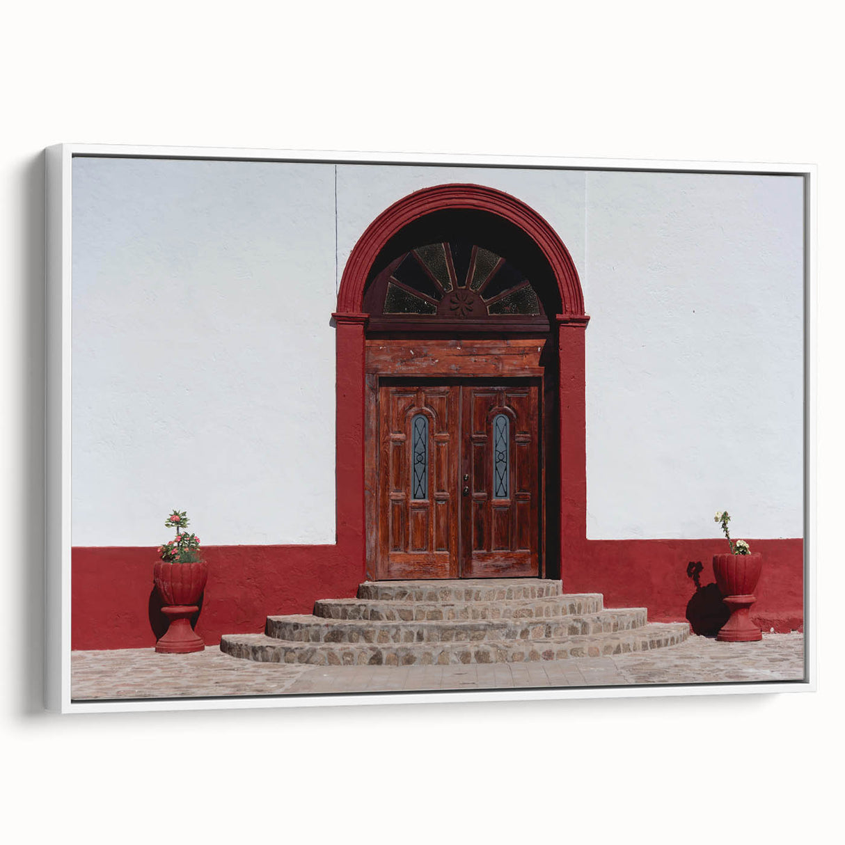 Vintage poster art of Baja California scenery on a framed canvas, featuring colorful art with black accents.