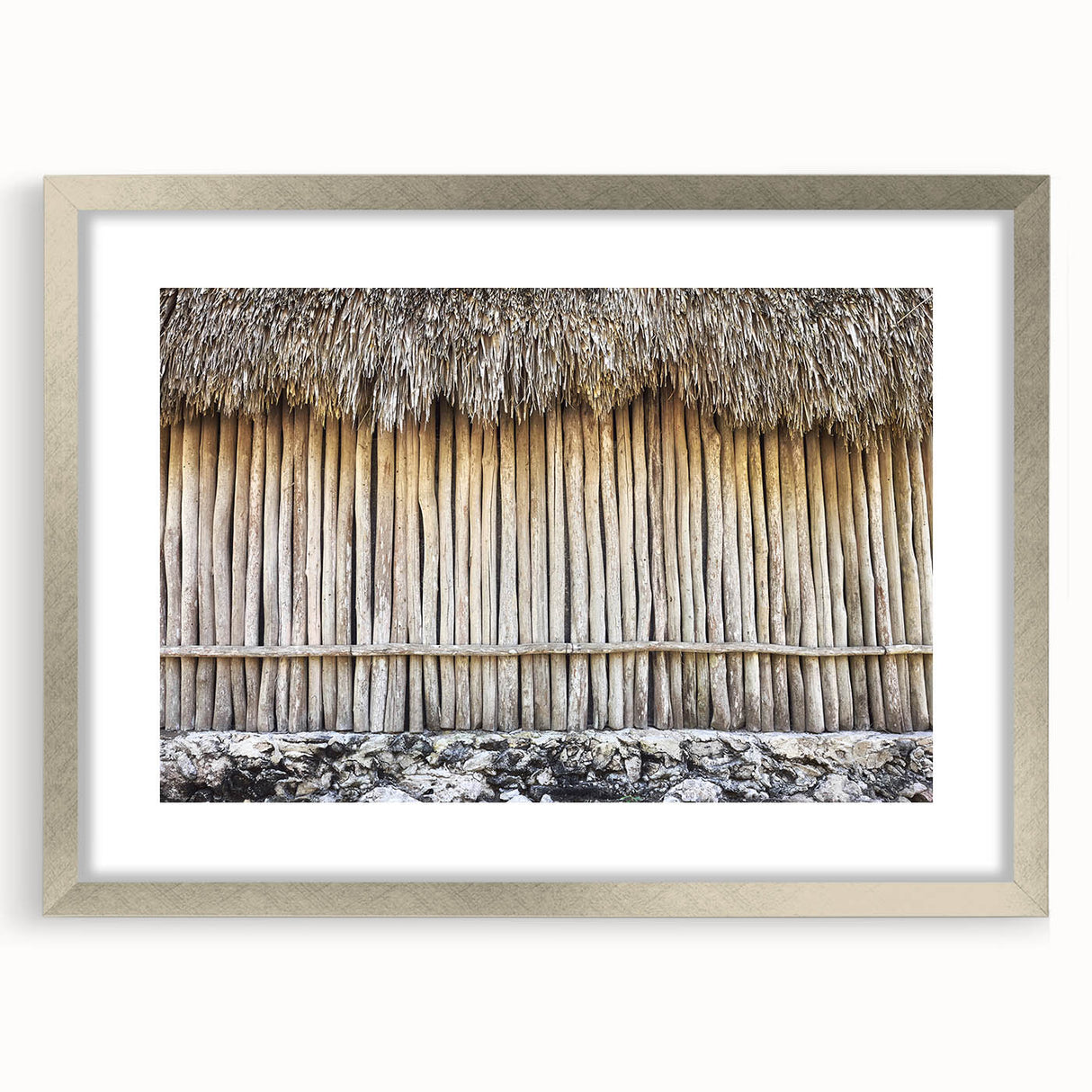 Textured abstract art print of Quintana Roo scenery in muted earth tones, framed in silver, ideal for bedroom art.