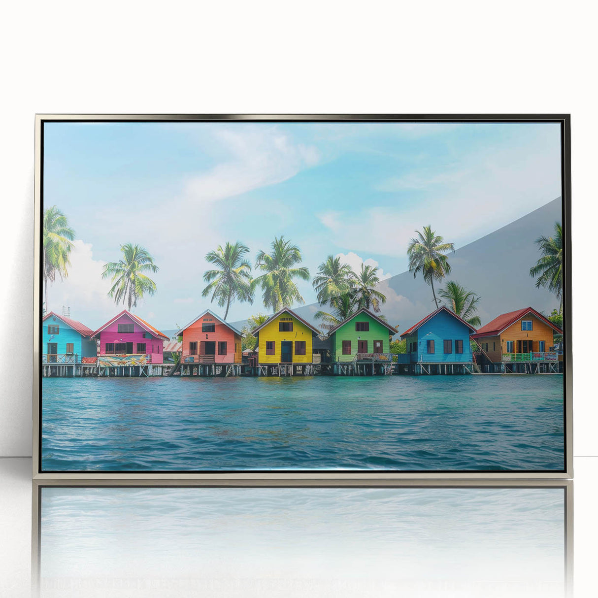 Mid-century modernist art depicting Tahitian scenery in vibrant blues and greens on a silver-framed acrylic print.