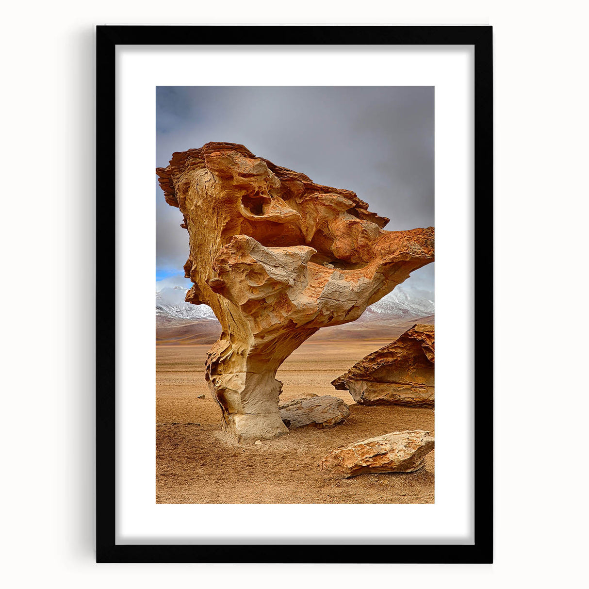 Extra large abstract art print of a colorful Bolivian landscape on a textured canvas, framed in black.