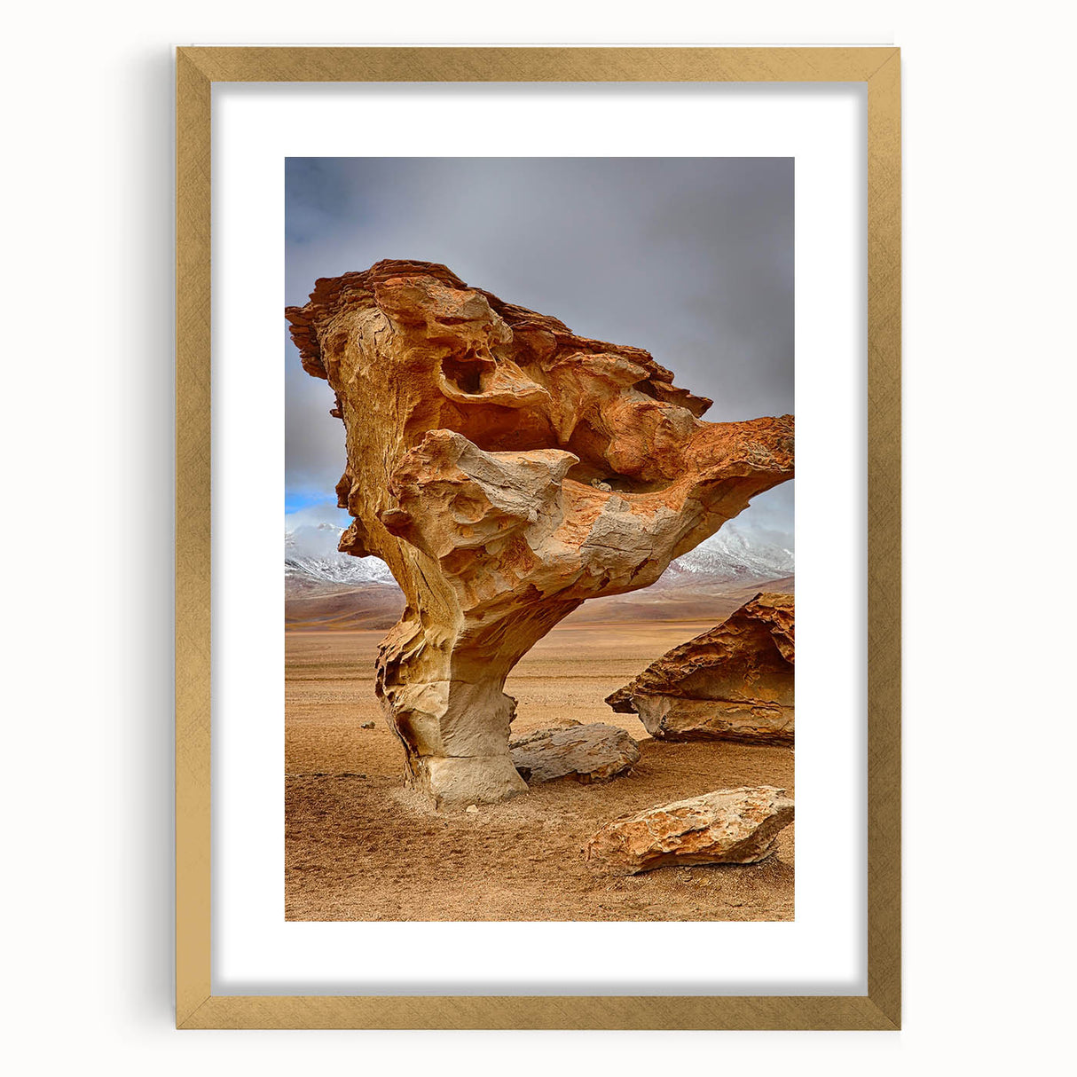Extra large abstract art print featuring textured scenery of Bolivia in muted earth tones, framed in gold.