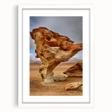 Abstract art print of a Bolivian landscape in muted earth tones on a white framed canvas, suitable for dining room decor.