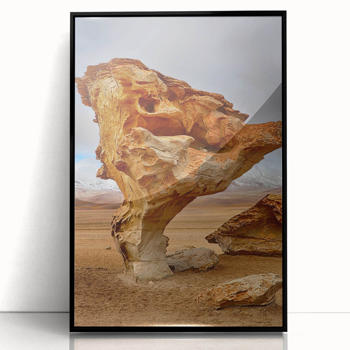 Large abstract wall art featuring a Bolivian landscape in muted earth tones, framed in black acrylic.