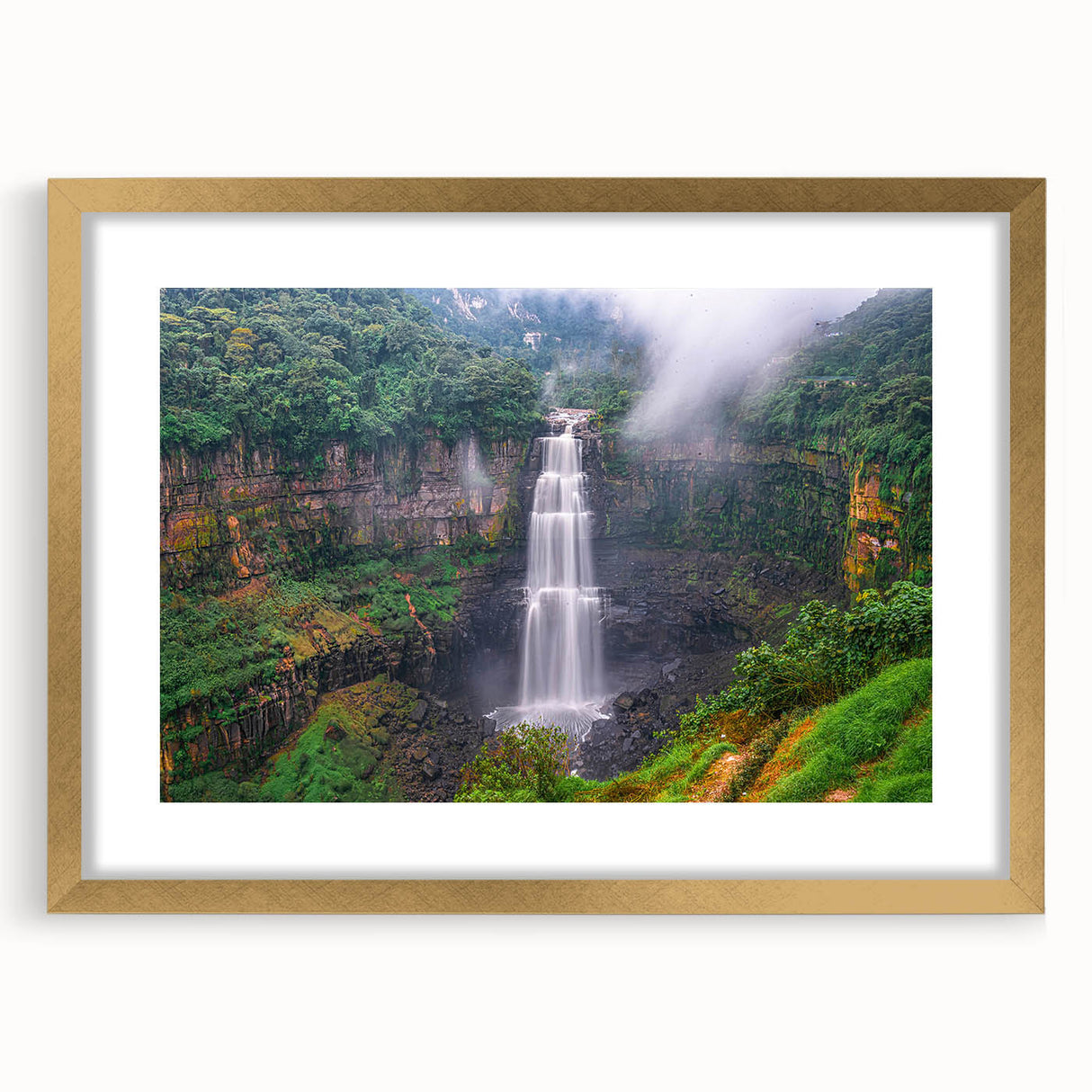 Extra large abstract art print of a textured Colombian landscape in gold frame, ideal for living room decor.