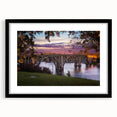 Colorful abstract art print of textured scenery in Alabama, showcased in a large black frame with mat.