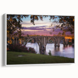 Vintage poster art of Alabama scenery in colorful hues on a white-framed canvas, ideal for living room decor.