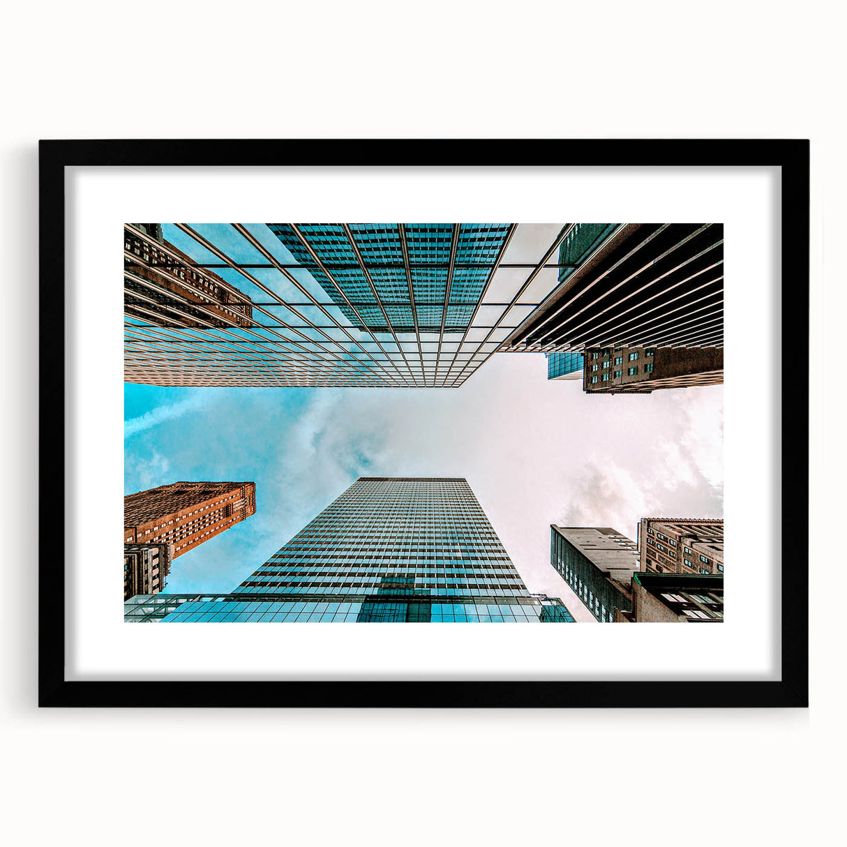 Extra large abstract art print of San Francisco skyline in vibrant, colorful hues on a framed black mat.