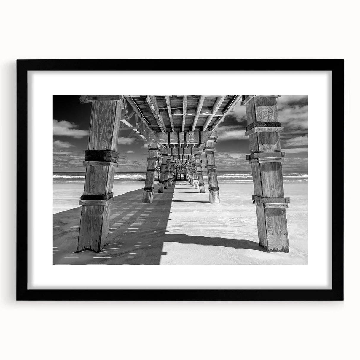 Extra large abstract art print featuring vibrant, colorful textures, displayed in a black frame, ideal for living room decor.