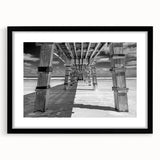 Extra large abstract art print featuring vibrant, colorful textures, displayed in a black frame, ideal for living room decor.