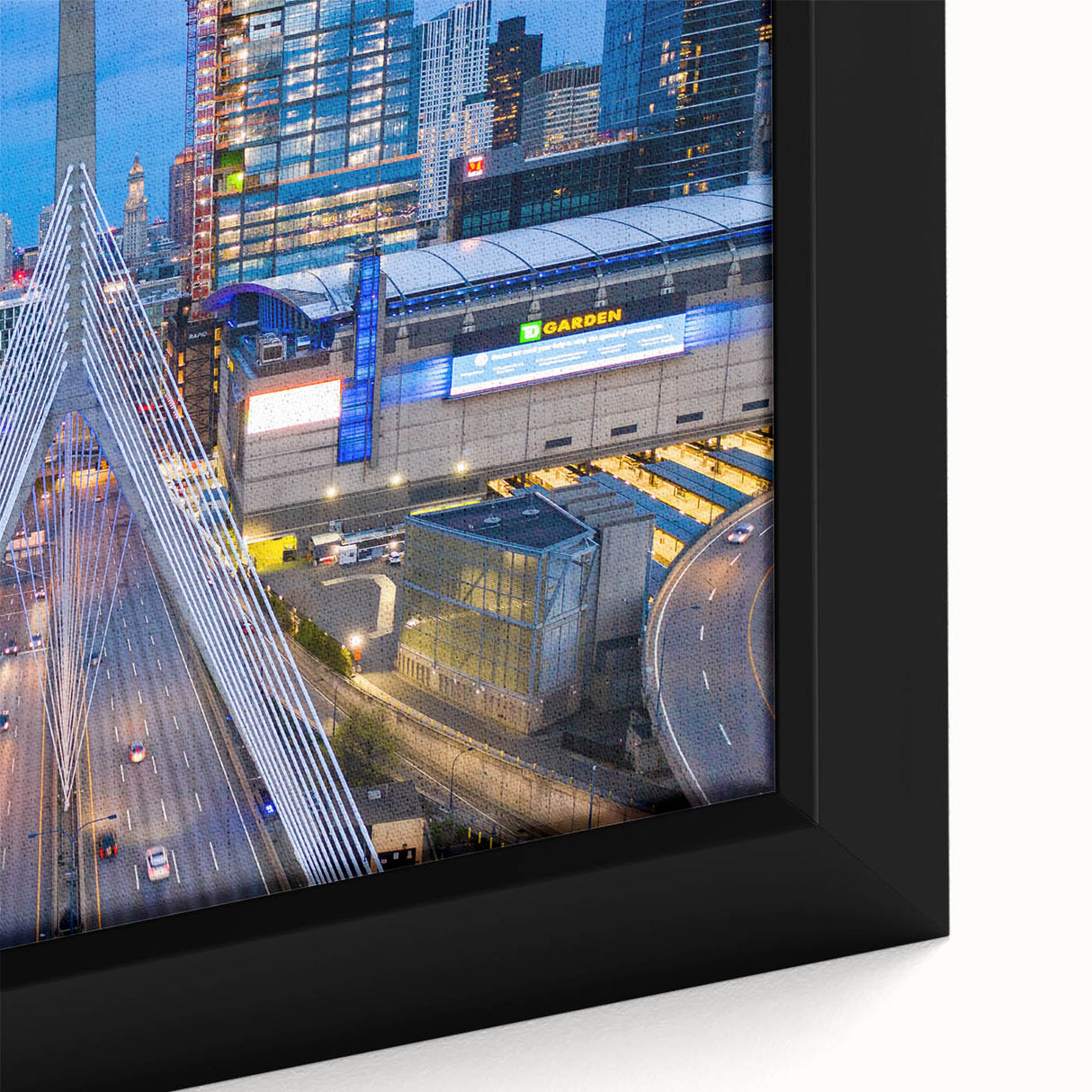 Close-up of a black wall art depicting Boston's skyline with textured, colorful art on a framed canvas.