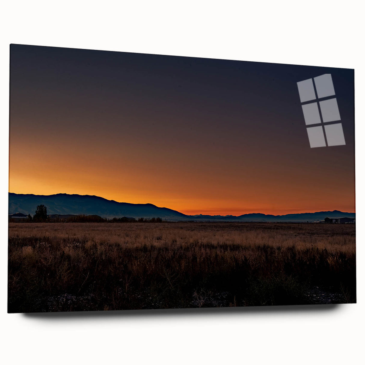 Large abstract wall art depicting Montana scenery in muted earth tones on acrylic glass.