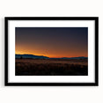 Abstract art print of a Montana landscape in vibrant colors on a large textured canvas, suitable for living room decor.