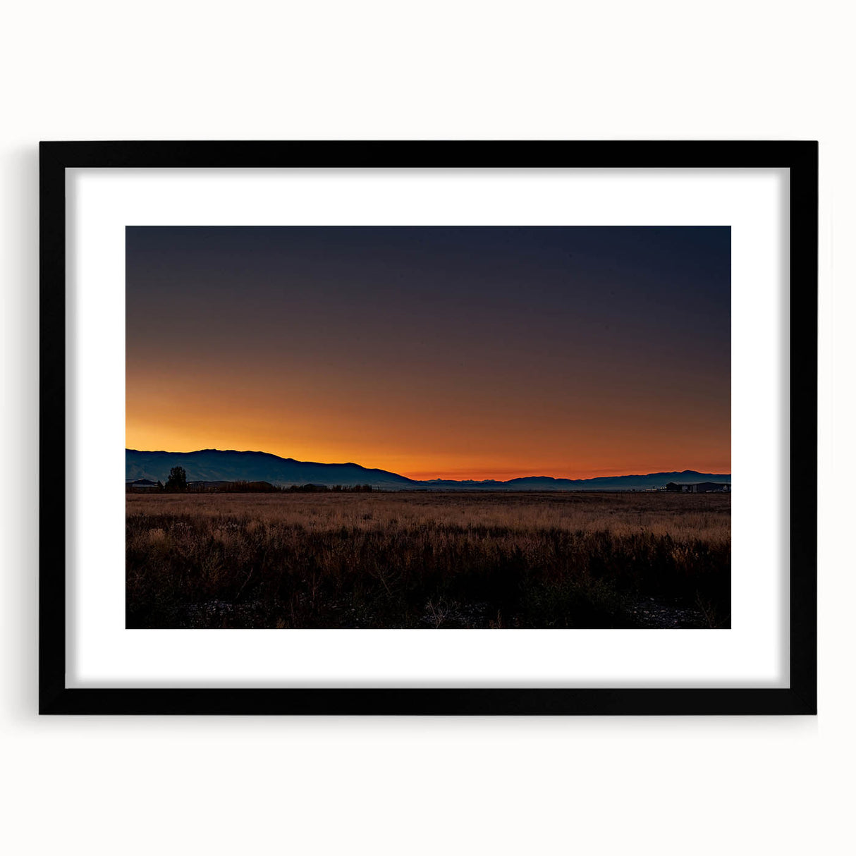 Abstract art print of a Montana landscape in vibrant colors on a large textured canvas, suitable for living room decor.