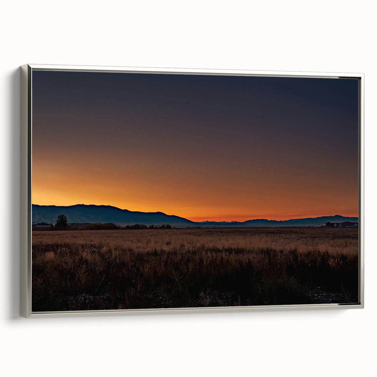 Framed canvas depicting a vintage-style Montana landscape, with colorful art elements and black border.