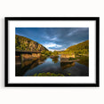 Colorful abstract art print of textured West Virginia scenery in black frame, ideal for living room decor.