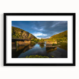 Colorful abstract art print of textured West Virginia scenery in black frame, ideal for living room decor.
