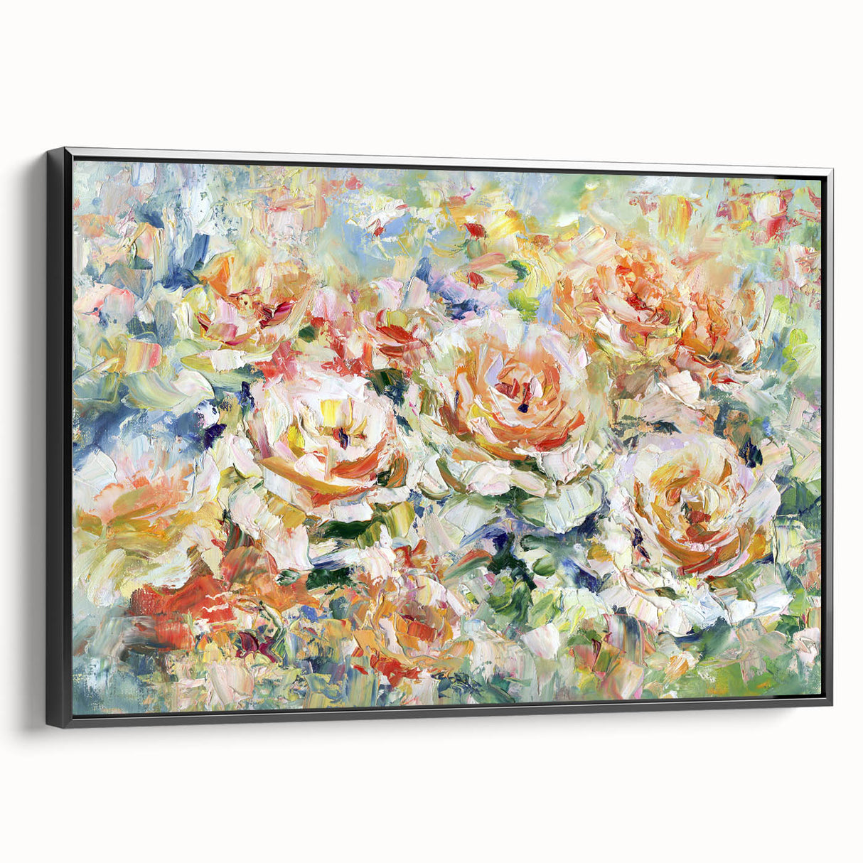 Framed canvas artwork displaying vibrant abstract floral designs in shades of pink, blue, and green, with a sleek black frame, ideal for modern home decor.