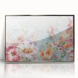 Framed acrylic artwork showcasing vibrant abstract florals in silver tones, perfect for modern home decor. The piece adds a touch of elegance and color to any room.