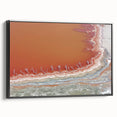 Framed abstract landscape canvas art showcasing rich earth tones and dynamic shapes, set against a sleek black frame, ideal for modern home decor.