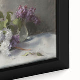 Close-up of a framed canvas artwork featuring vibrant abstract floral designs in hues of pink, blue, and green, showcasing intricate details and textures.