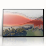 Framed abstract landscape artwork showcasing vibrant colors and fluid forms, set in a sleek black frame. Ideal for modern home decor, enhancing any space.
