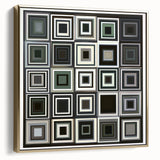 Framed abstract geometric wall art in silver and gold tones, showcasing modern design elements suitable for contemporary home decor, displayed in an elegant setting.
