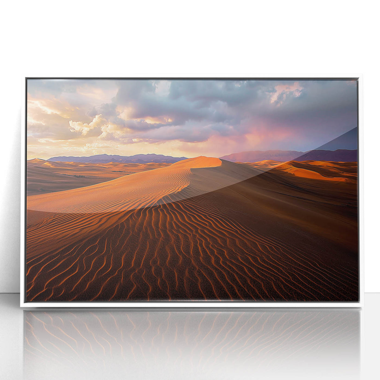 Framed acrylic artwork depicting serene sand dunes in a desert landscape, showcased in a sleek white frame, perfect for modern home decor. Ideal for art enthusiasts.