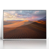 Framed acrylic artwork depicting serene sand dunes in a desert landscape, showcased in a sleek white frame, perfect for modern home decor. Ideal for art enthusiasts.