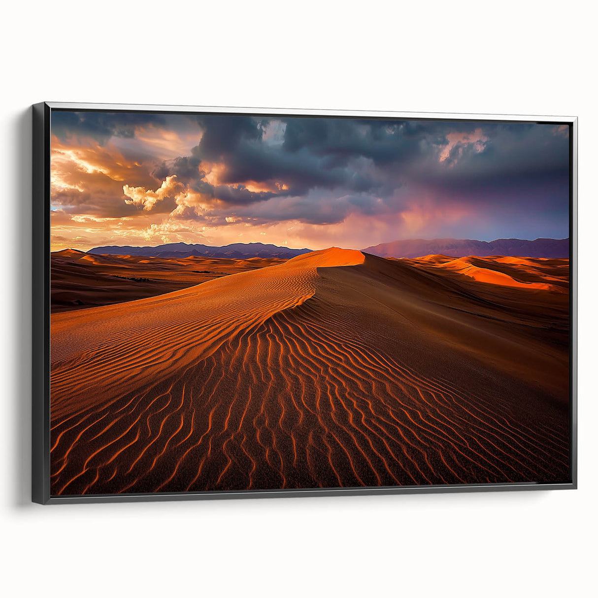 Framed canvas artwork showcasing a stunning desert landscape with golden sand dunes, elegantly displayed in a sleek black frame, ideal for modern home decor.