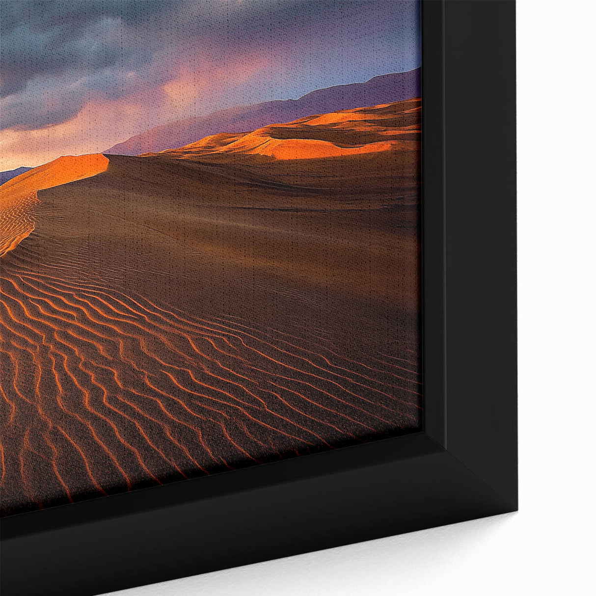 Framed canvas artwork depicting a close-up of colorful sand dunes, showcasing intricate textures and warm hues of orange and gold, perfect for enhancing modern interiors.