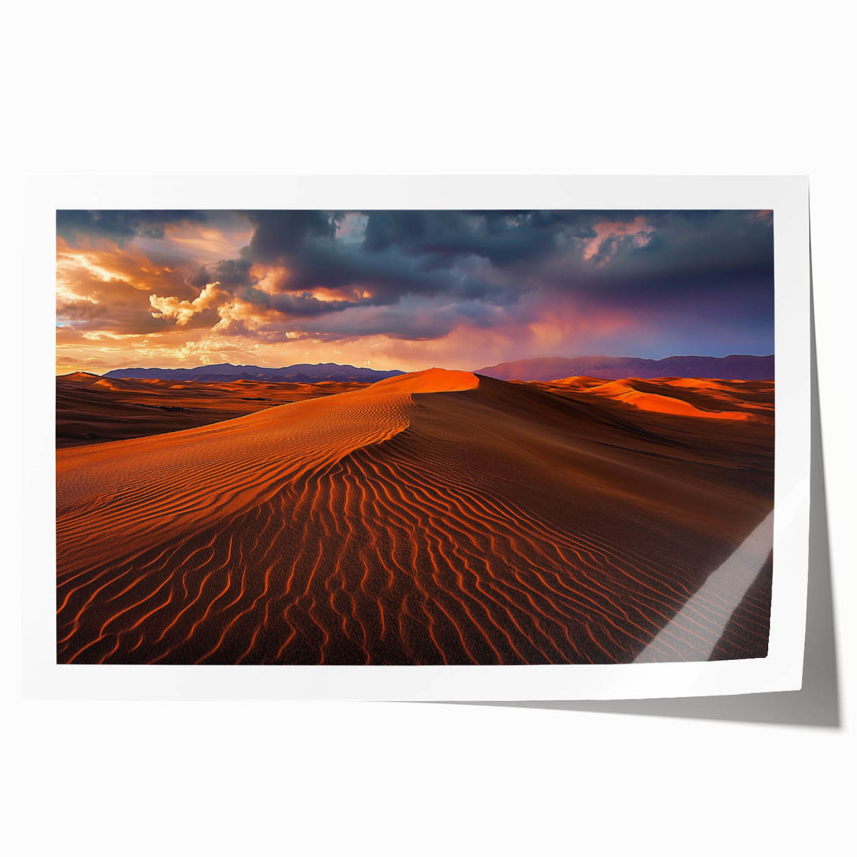 Landscape canvas print showcasing vibrant desert dunes under a clear blue sky, elegantly rolled and packaged in a sturdy cardboard tube for safe delivery. Perfect for enhancing modern home decor with a touch of natural beauty.