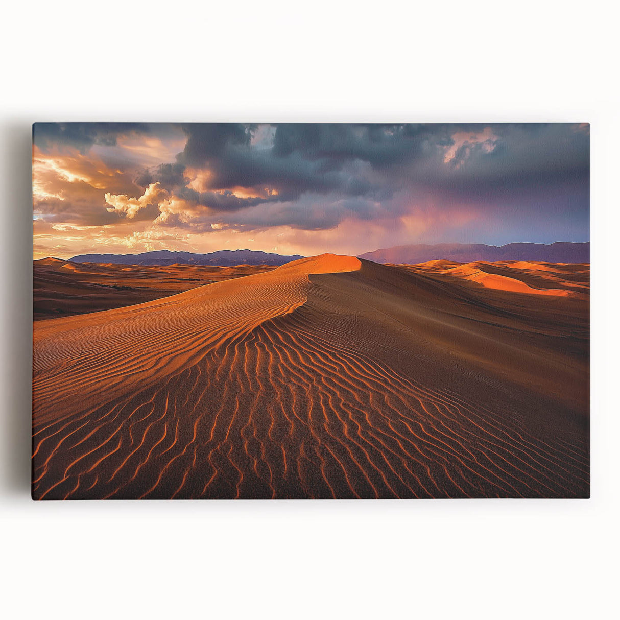 Stretched canvas artwork depicting serene sand dunes under a vibrant sunset, showcasing warm hues of orange and yellow, perfect for home decor or office ambiance.