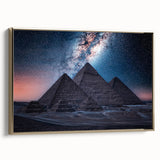 Framed canvas featuring a vintage-style landscape painting of an Egyptian scene in gold, black, and vibrant colors.
